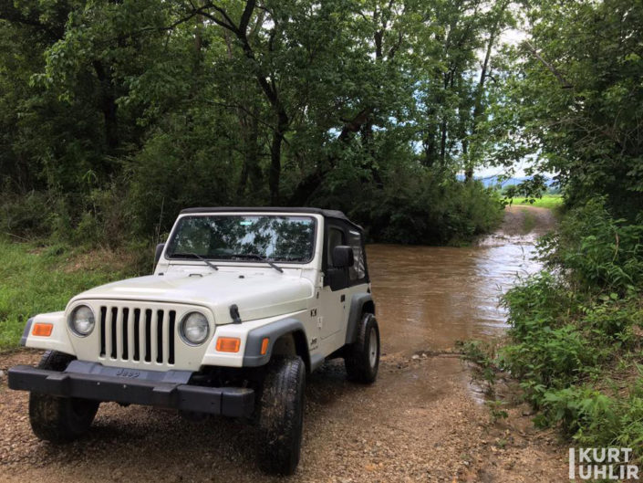 Kurt Uhlir - off-roading - river crossing in the Jeep