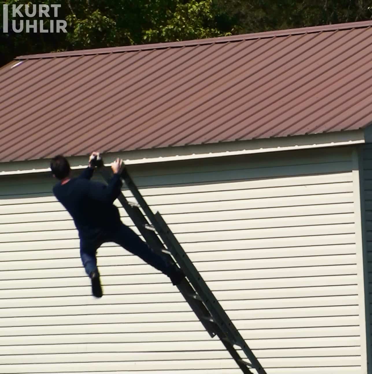 Stuntman Kurt Uhlir falling off a ladder